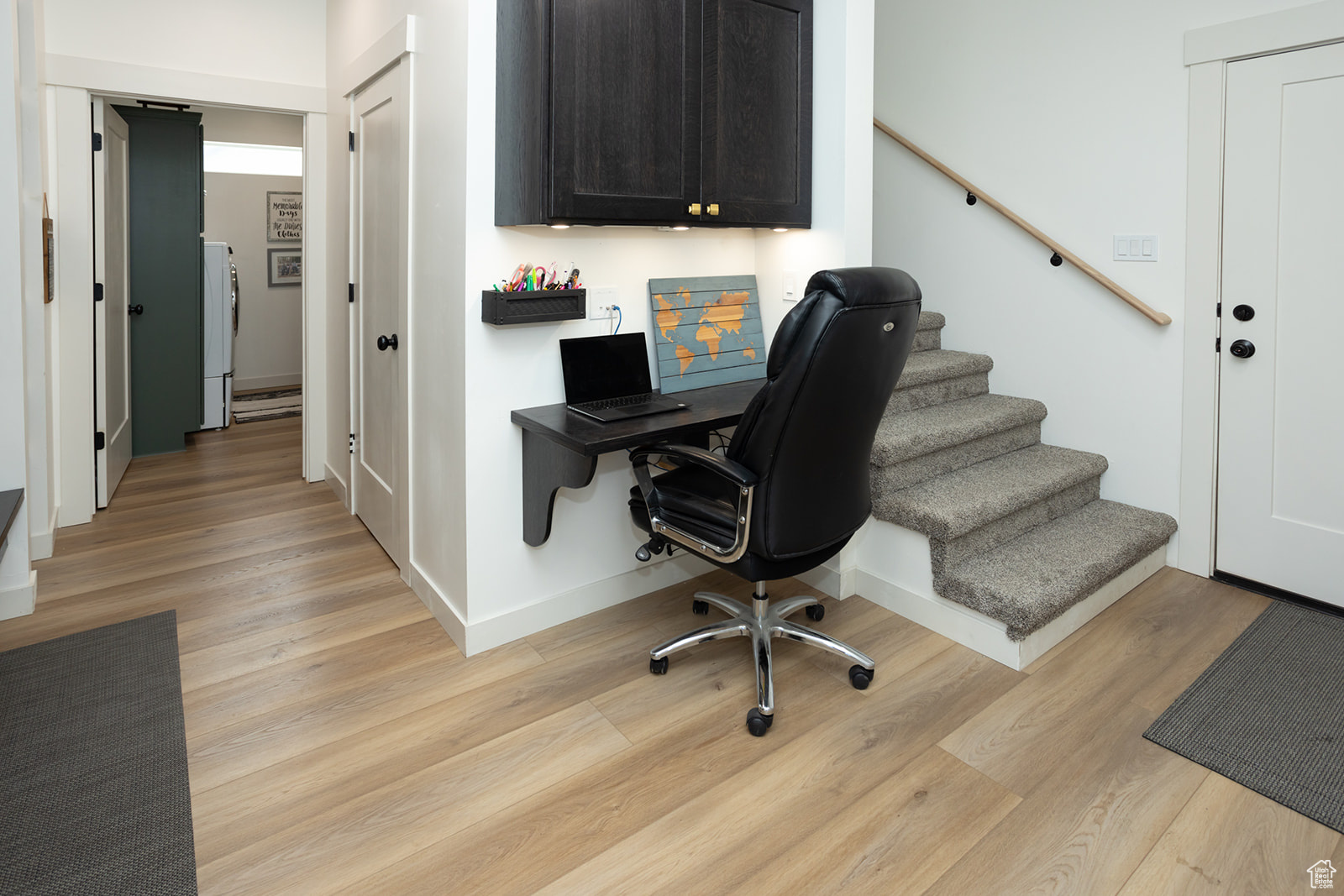 Office area featuring light hardwood / wood-style floors