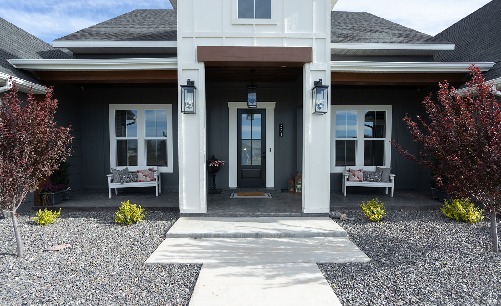 Entrance to property featuring covered porch