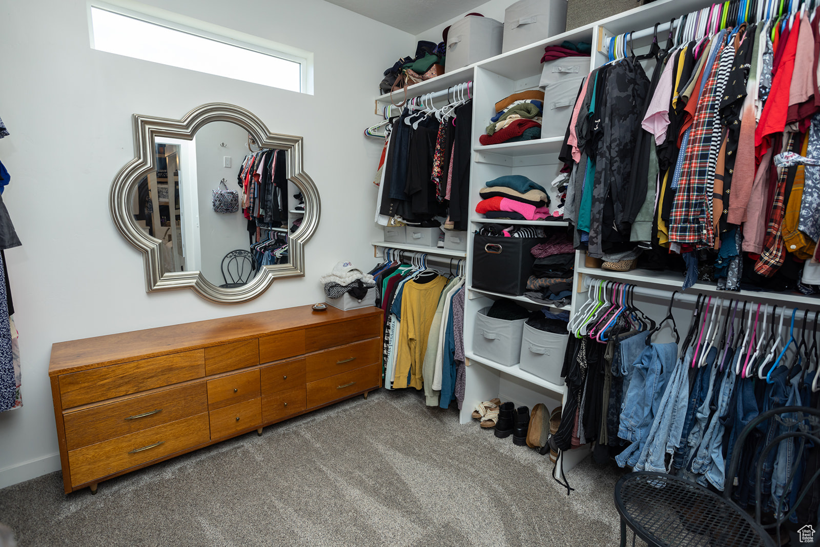 Walk in closet featuring carpet floors