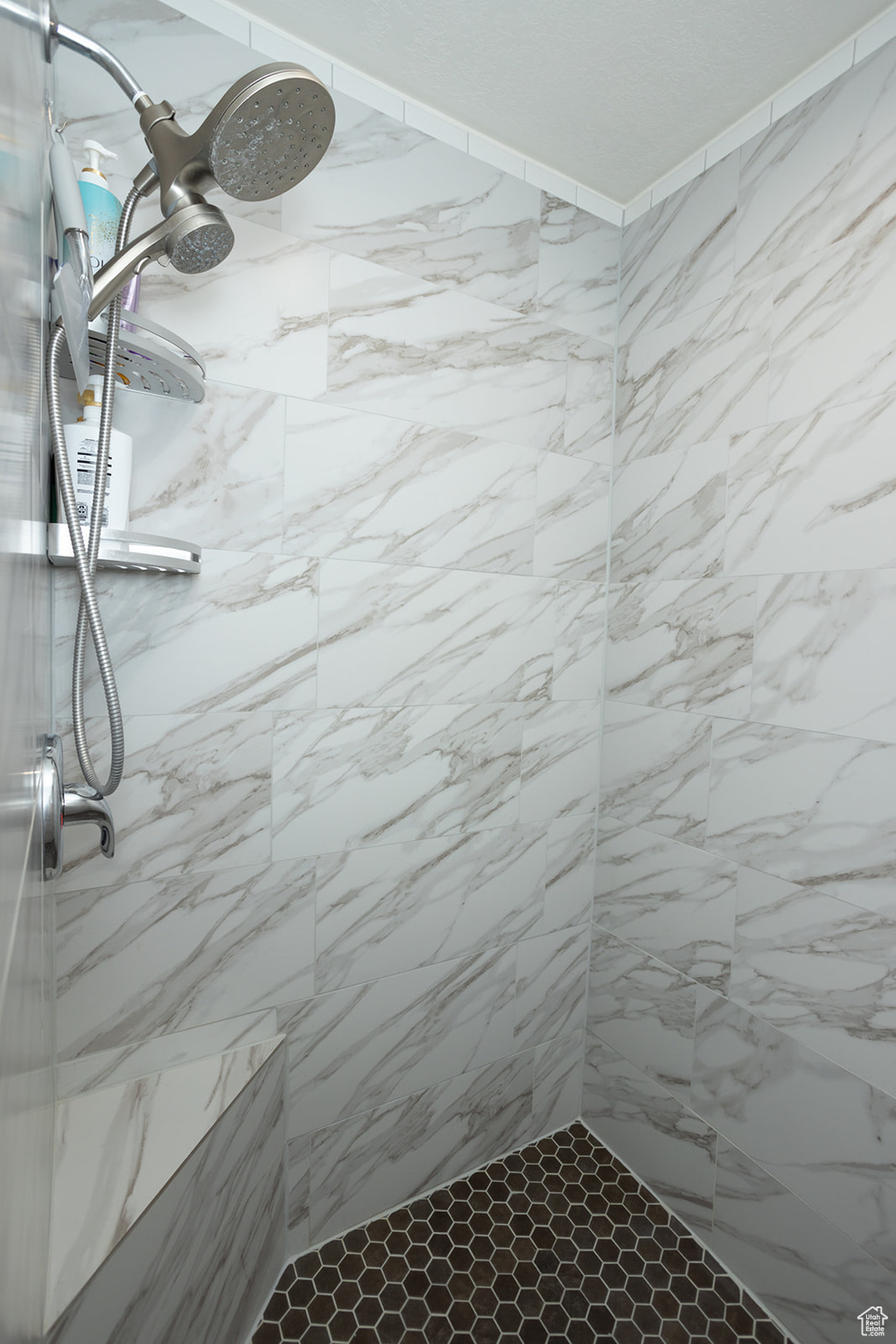 Bathroom with a tile shower