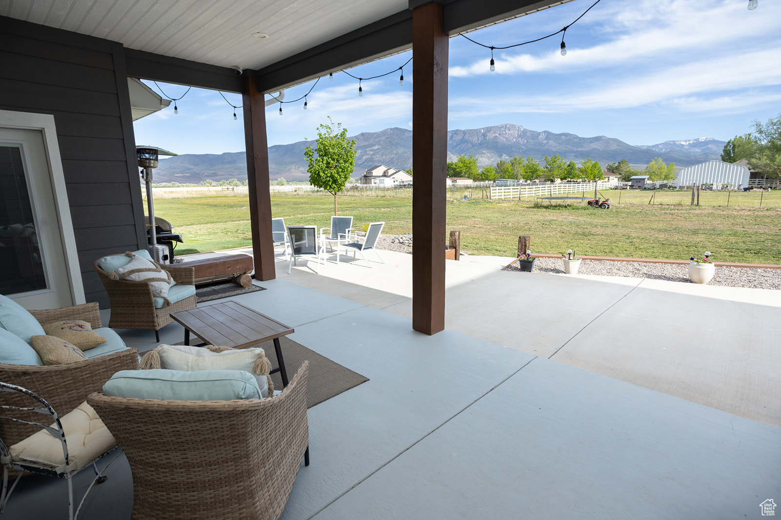 View of patio / terrace with a mountain view and an outdoor living space