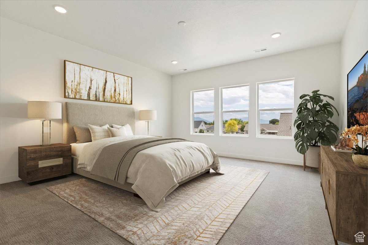 View of carpeted bedroom