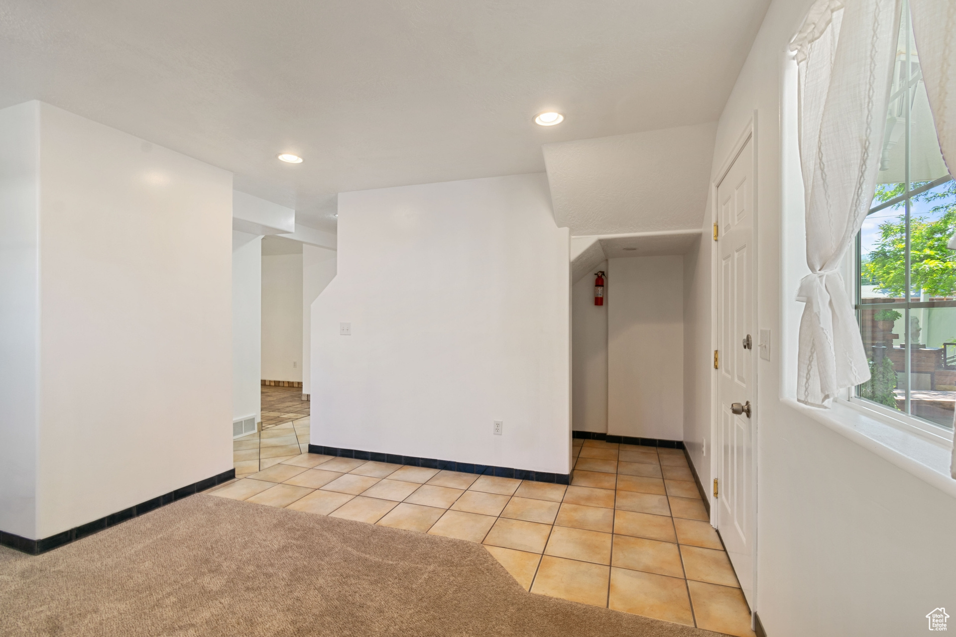 Interior space with light tile floors