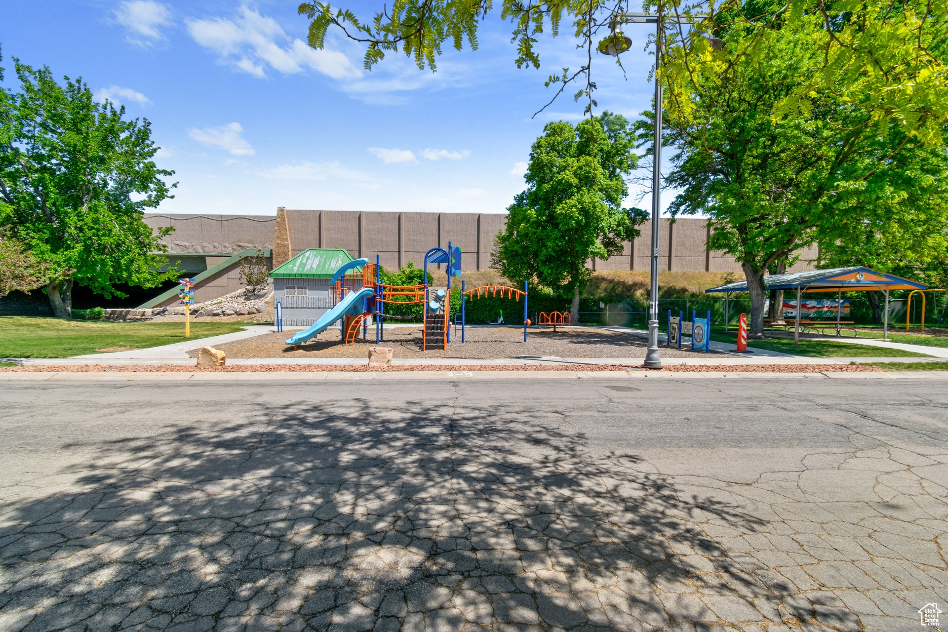 View of front of home with a playground