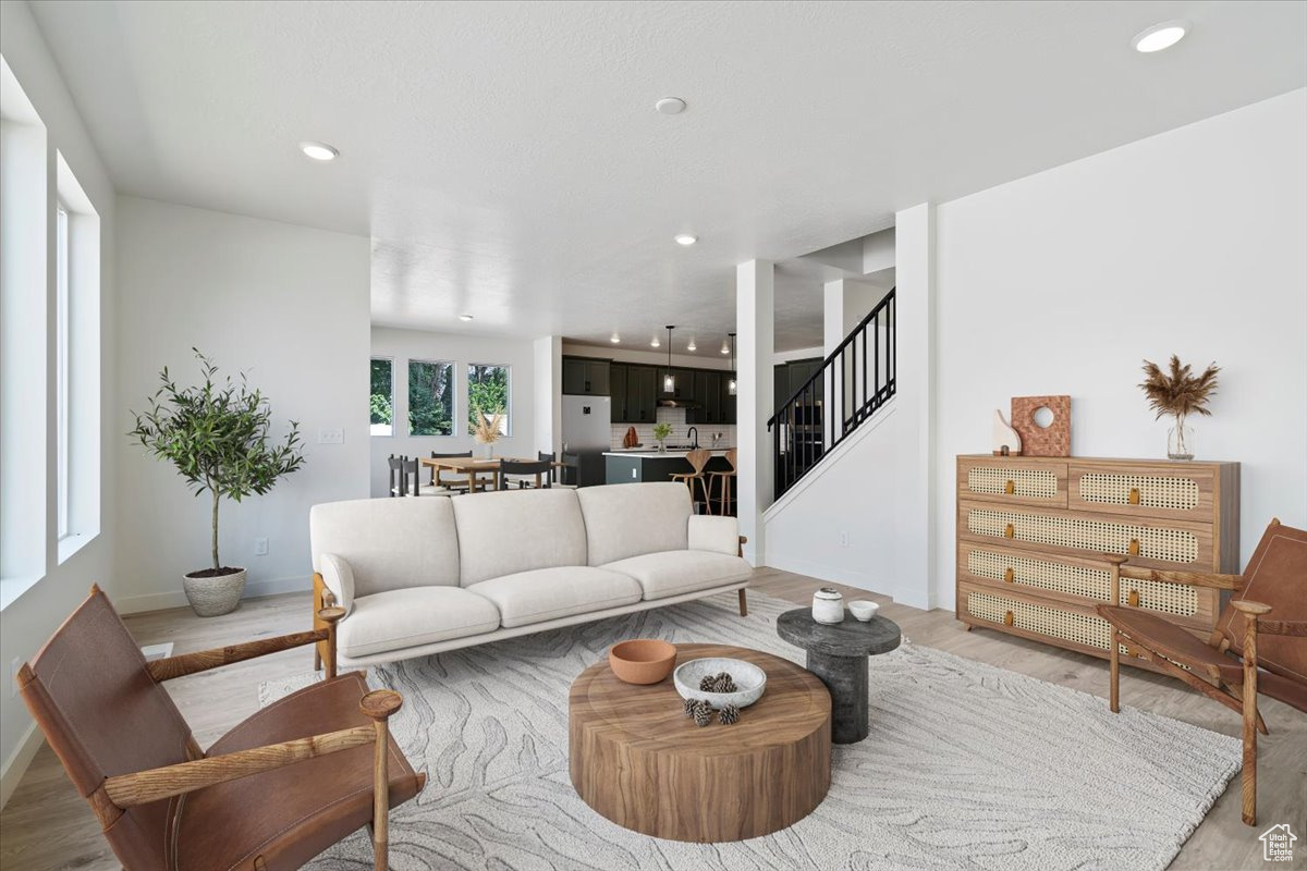 Living room featuring light hardwood / wood-style flooring