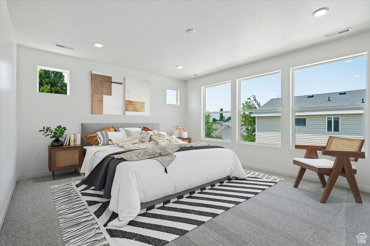 Bedroom featuring carpet floors