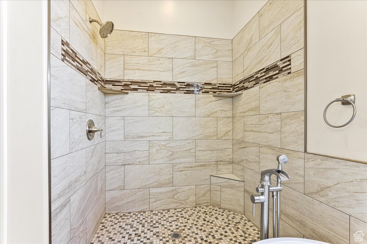 Bathroom with a tile shower