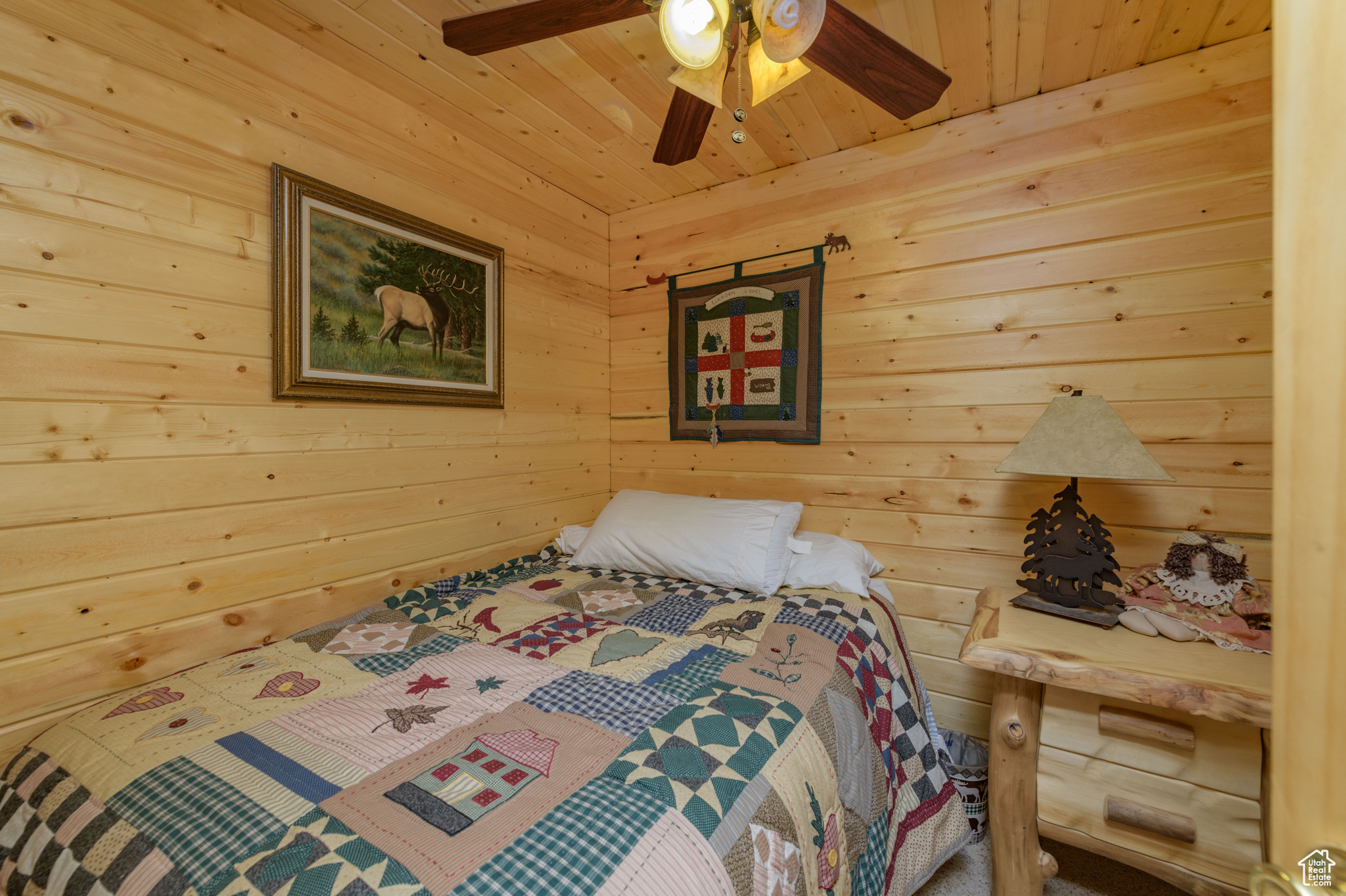 Bedroom featuring wooden ceiling and ceiling fan