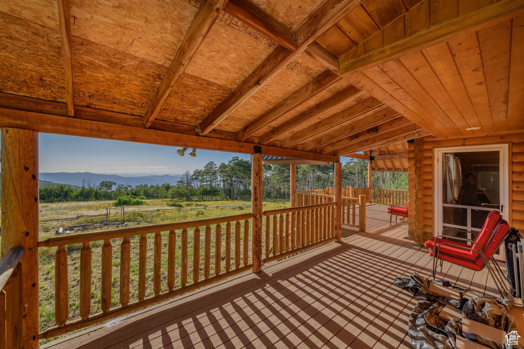 Wooden deck featuring a mountain view