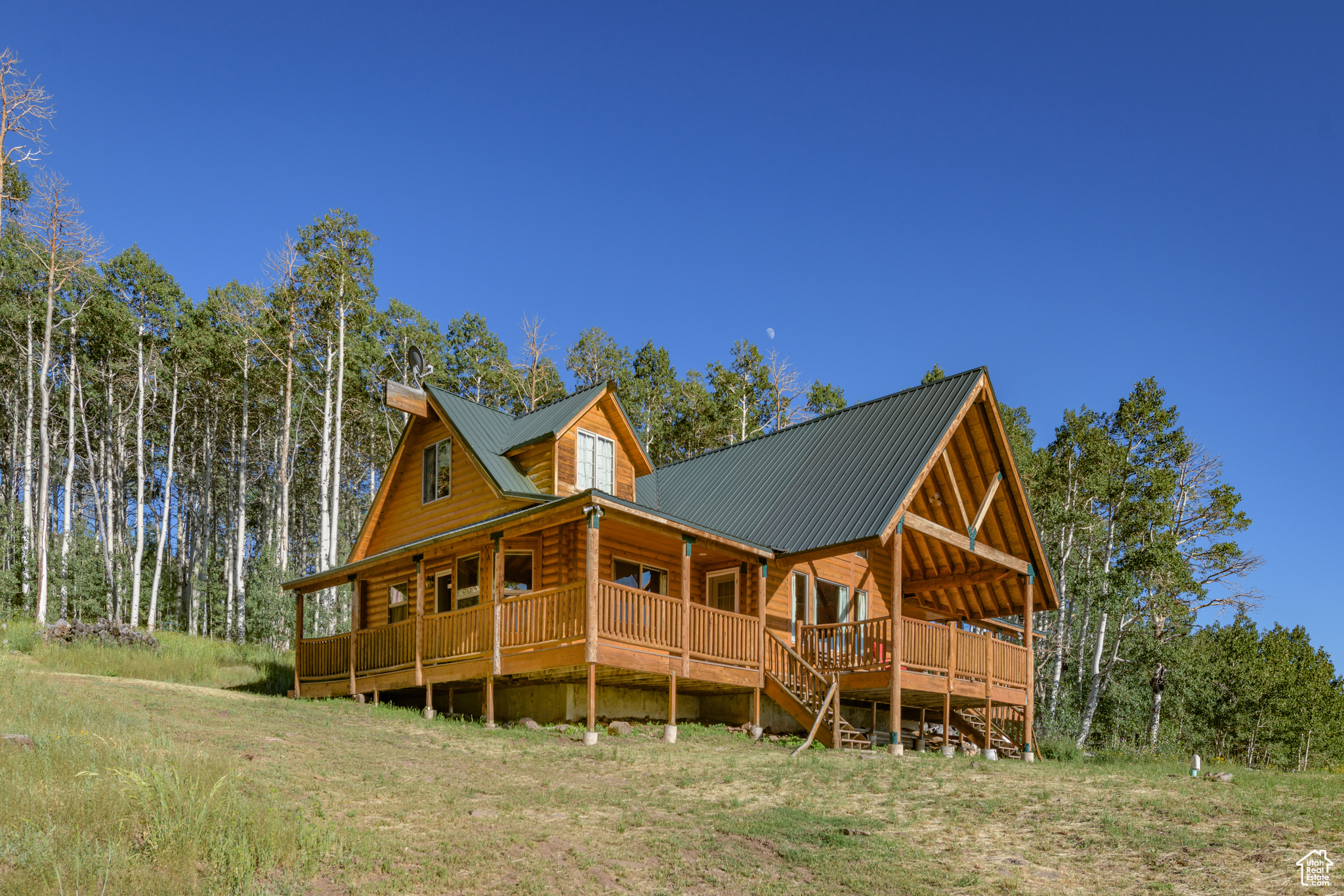 Rear view of house featuring a deck