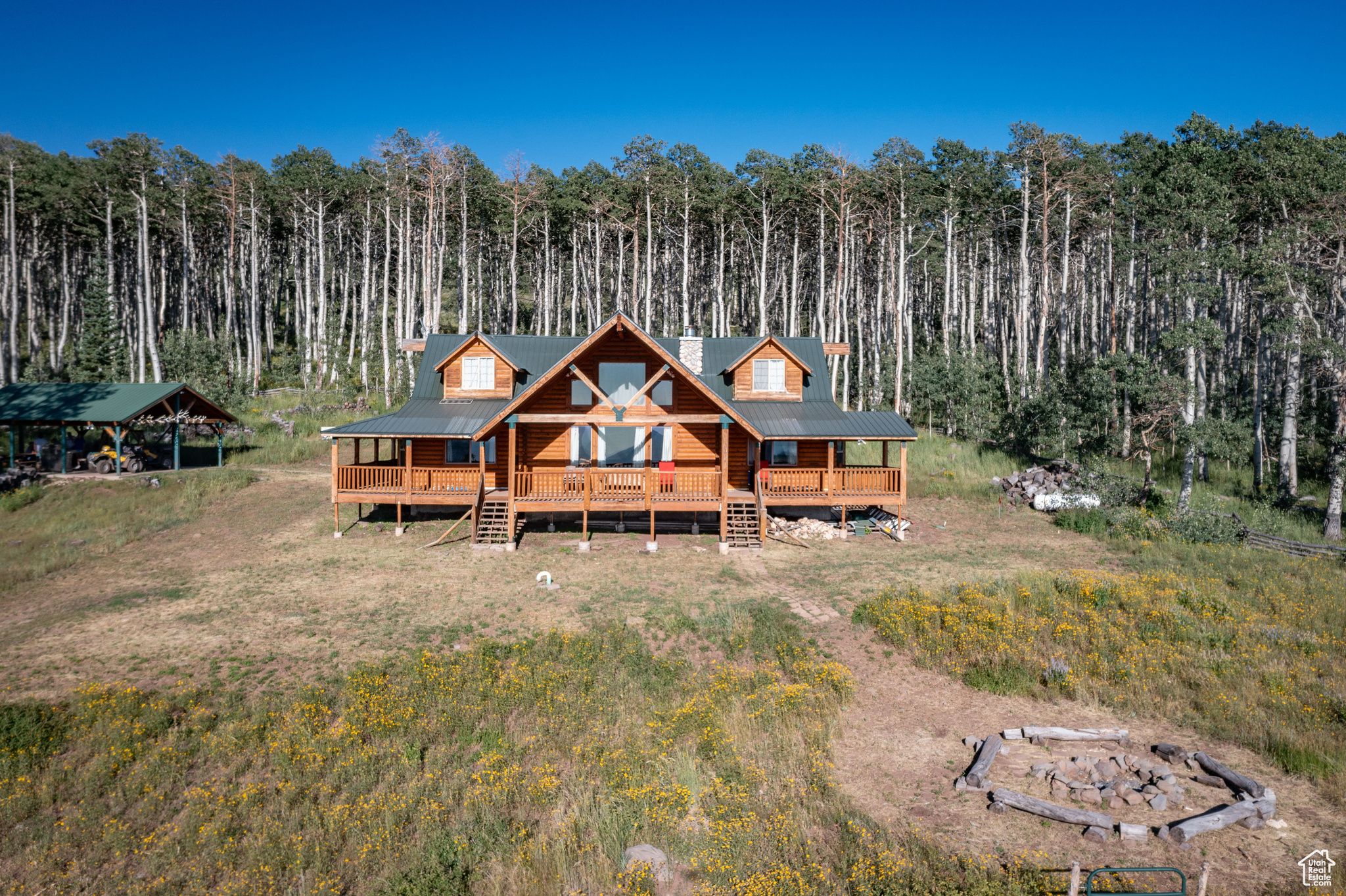 Back of property with a wooden deck