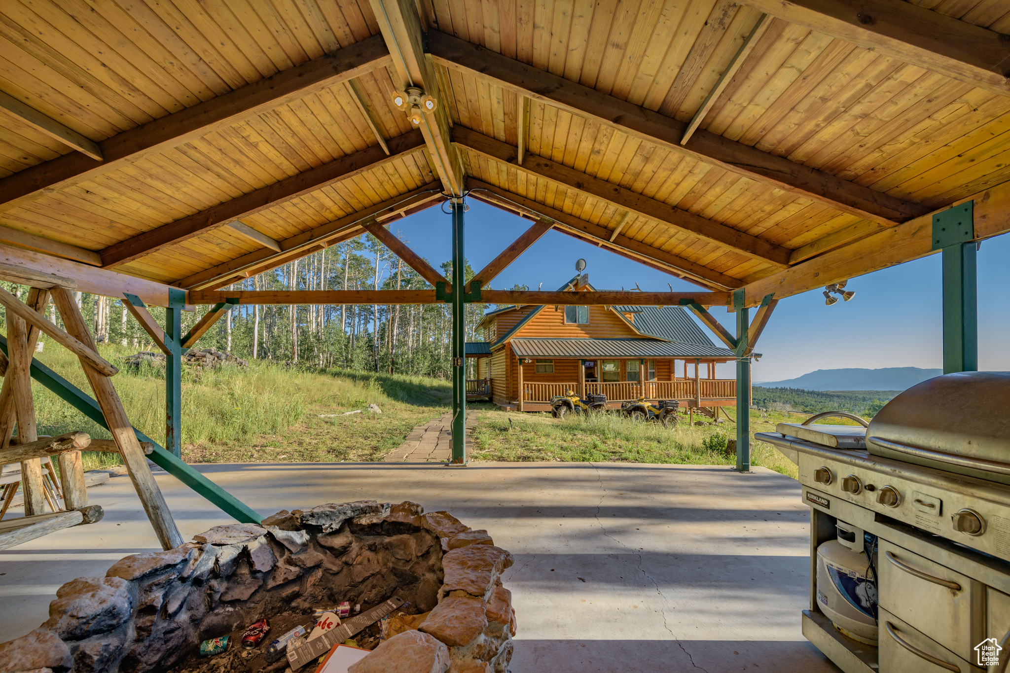 View of patio with a mountain view, a gazebo, and area for grilling