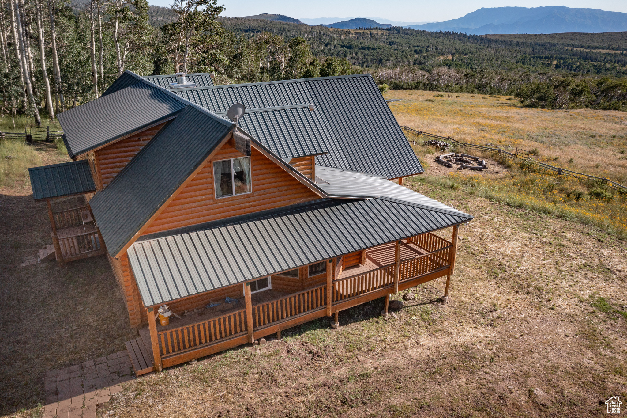 Birds eye view of property with a mountain view