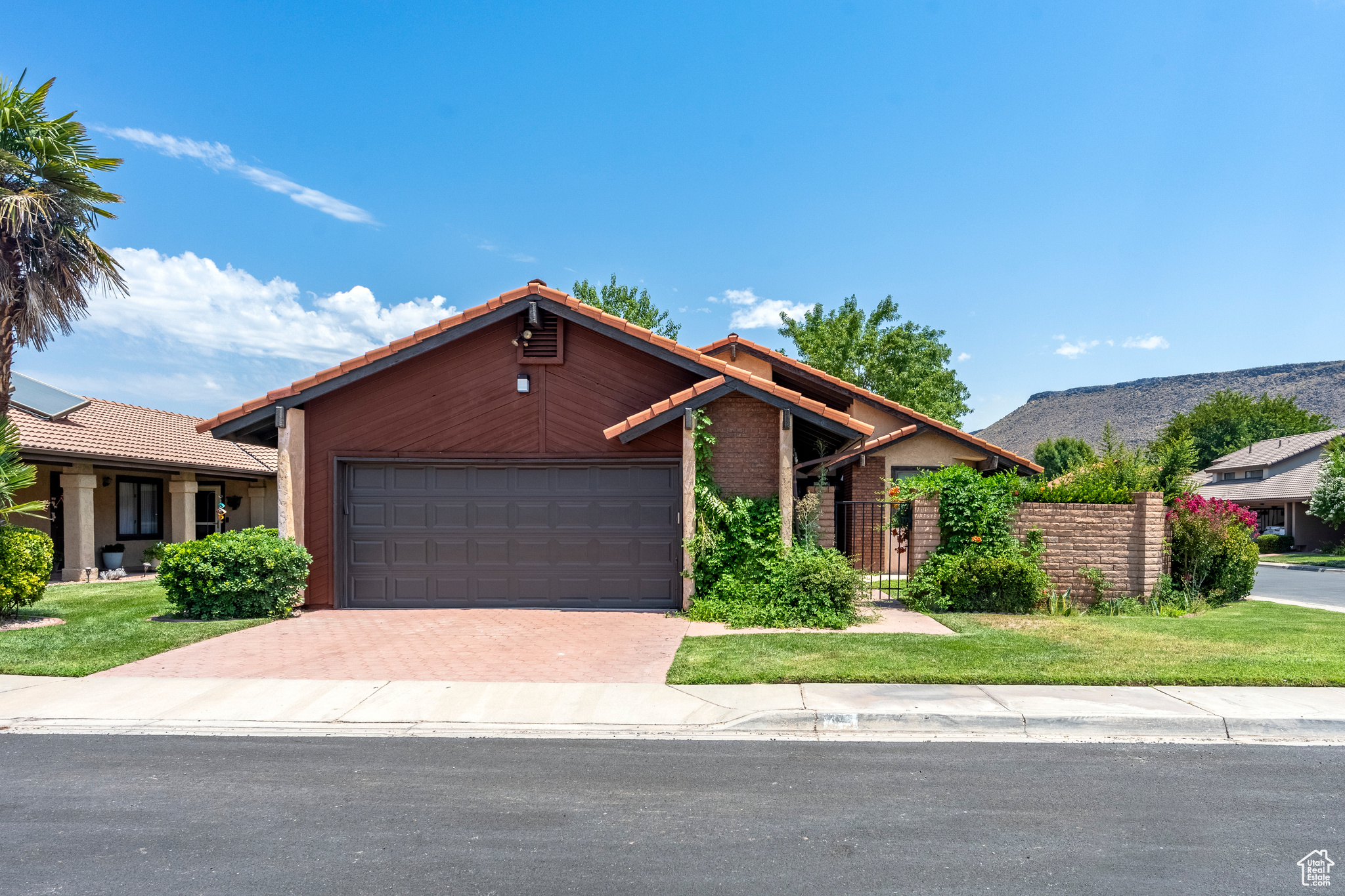 View of front of property with a garage