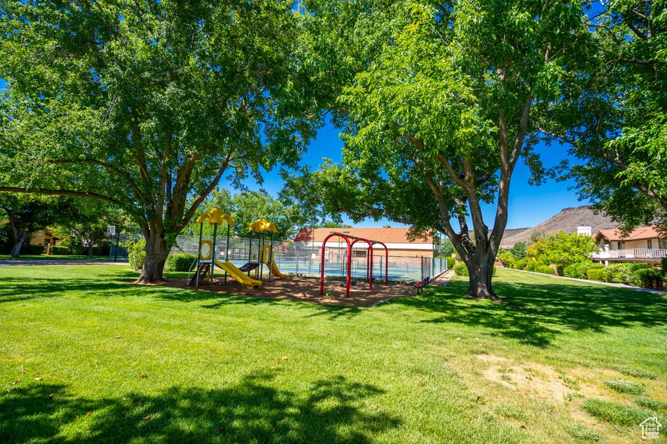 View of yard featuring a playground