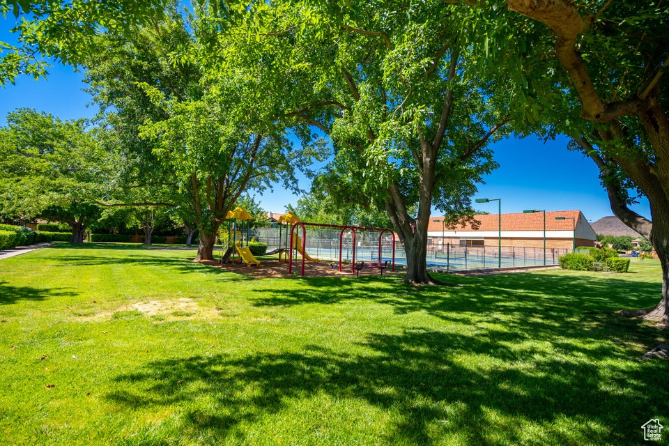 View of yard featuring a playground