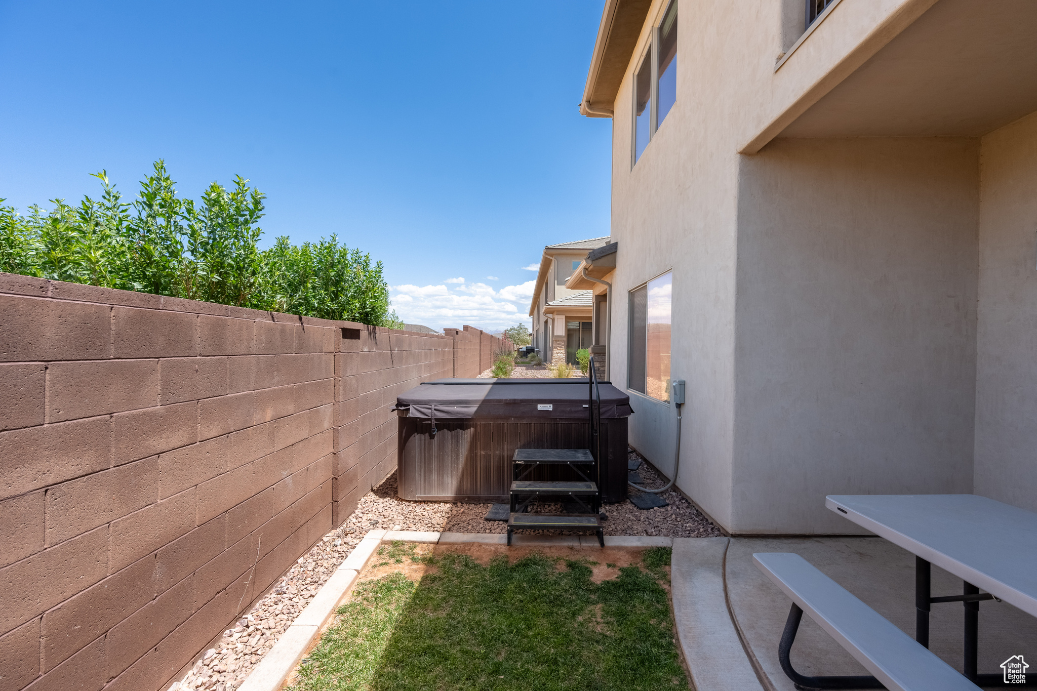 View of yard with a hot tub