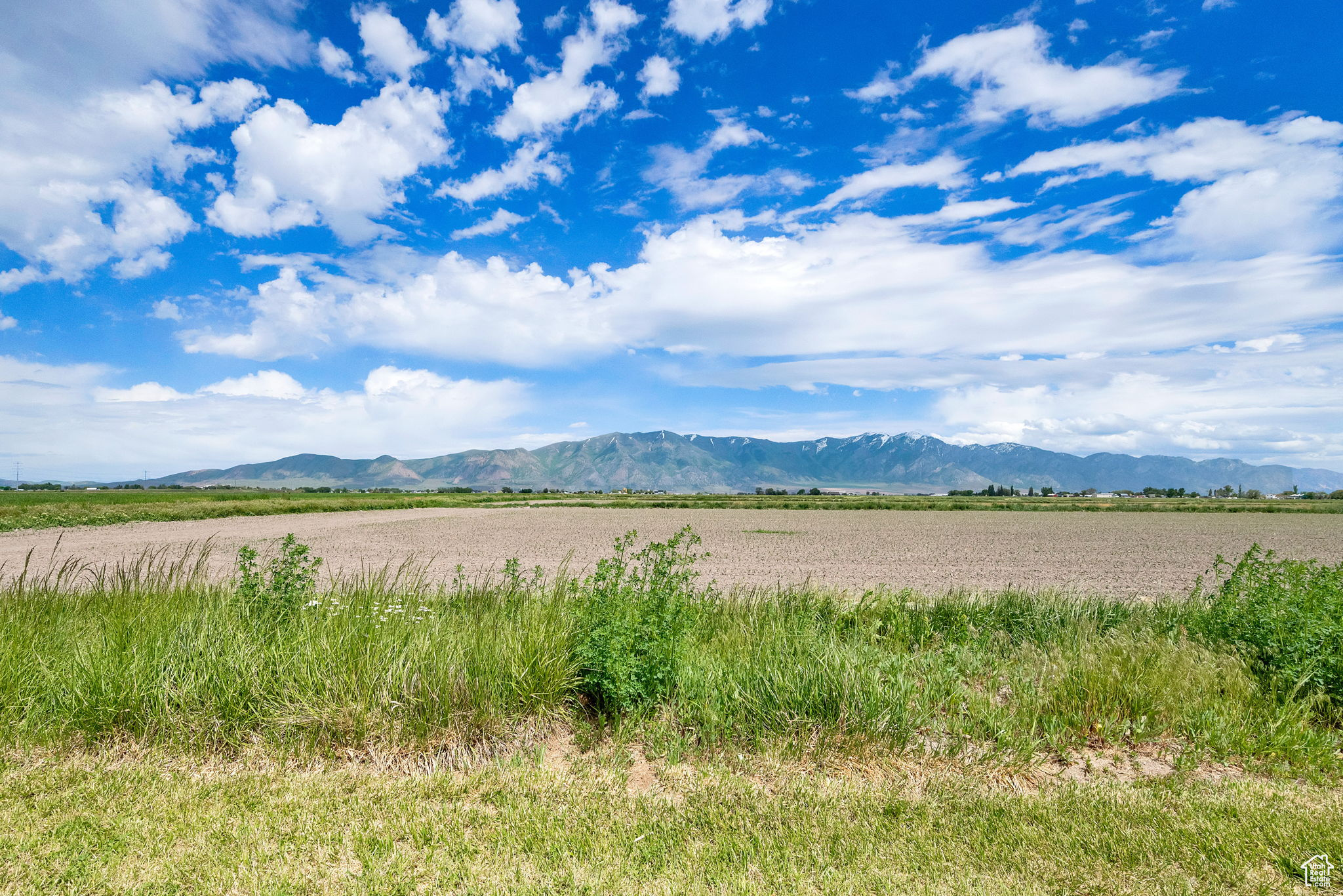 Property view of mountains with a rural view