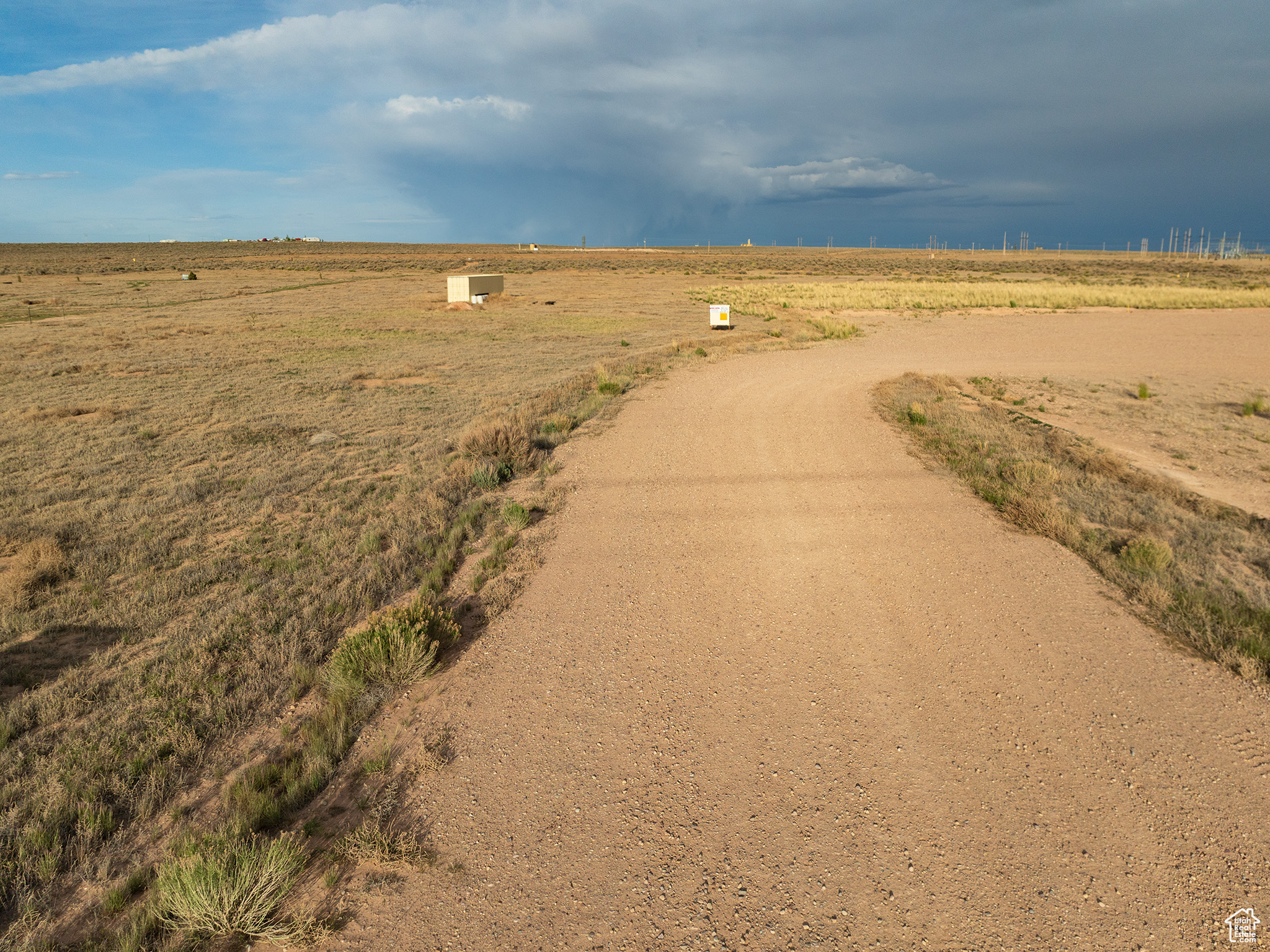 View of home's community with a rural view