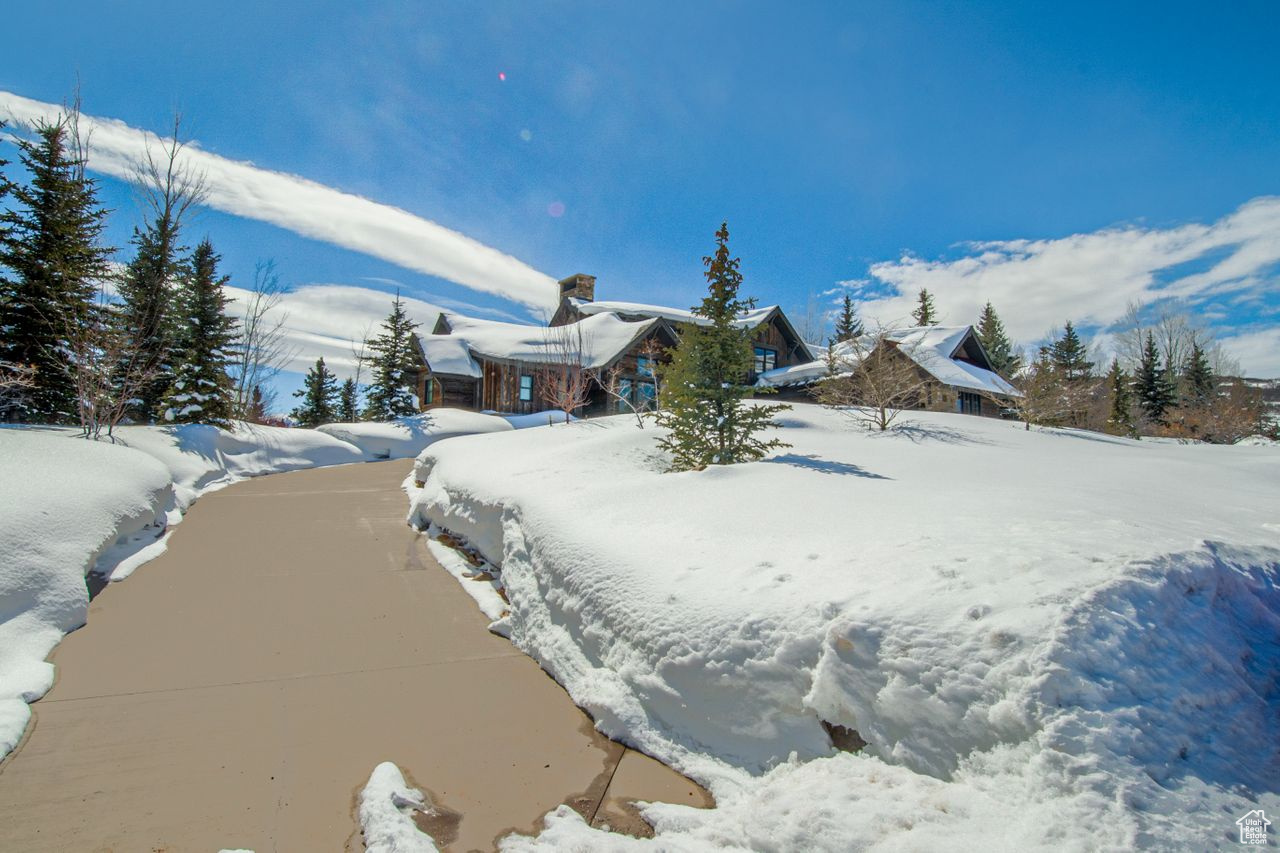 View of yard layered in snow