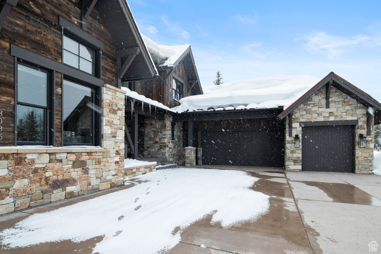 View of snow covered property