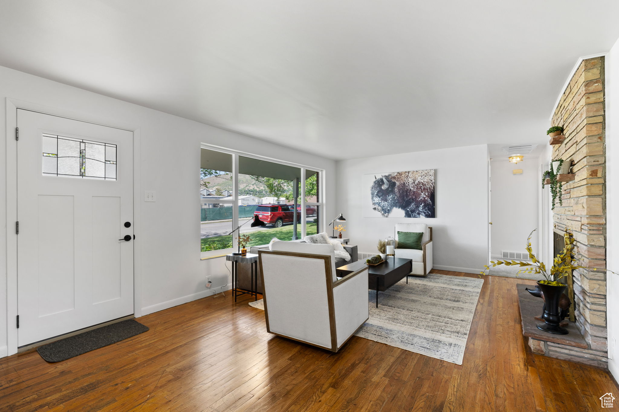 Living room featuring dark wood-type flooring