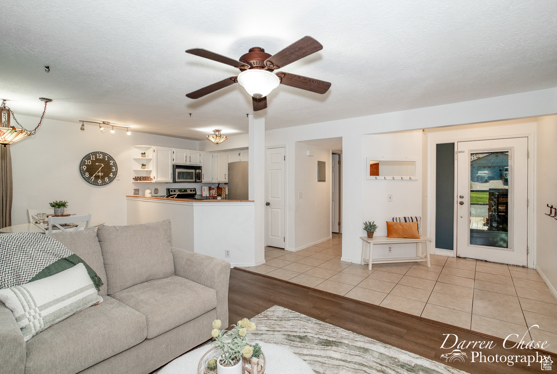 View of living room, dining, kitchen & entry