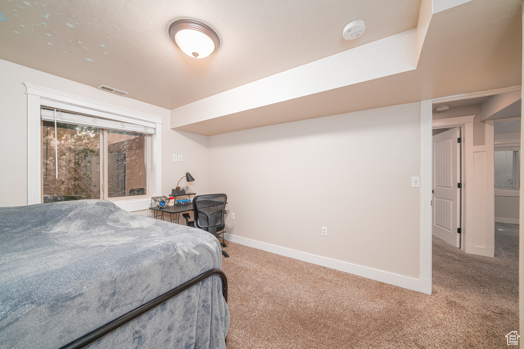 View of carpeted bedroom