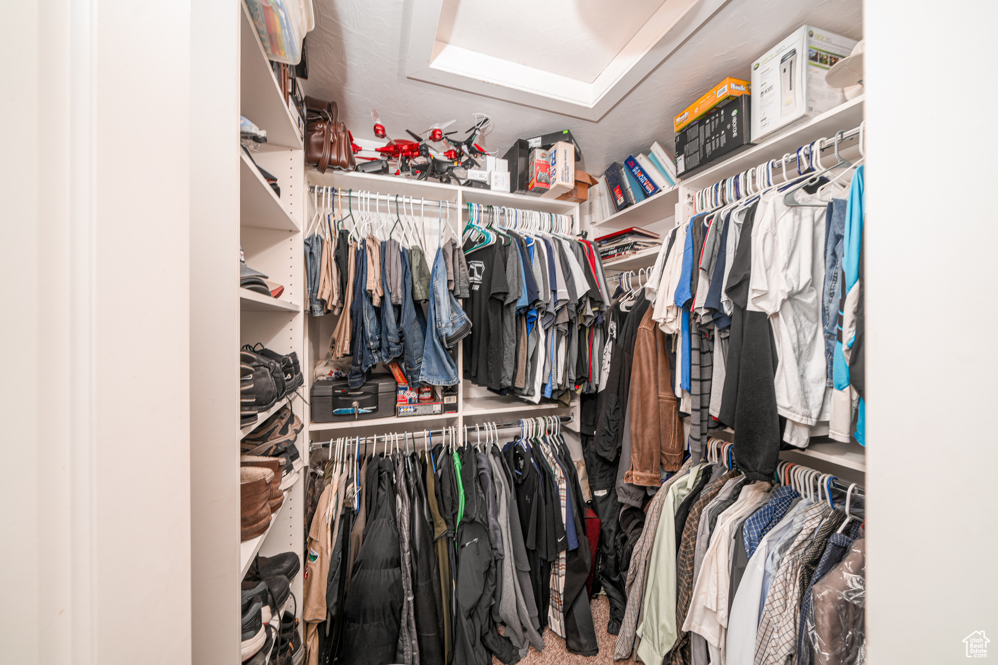 Spacious closet with carpet floors