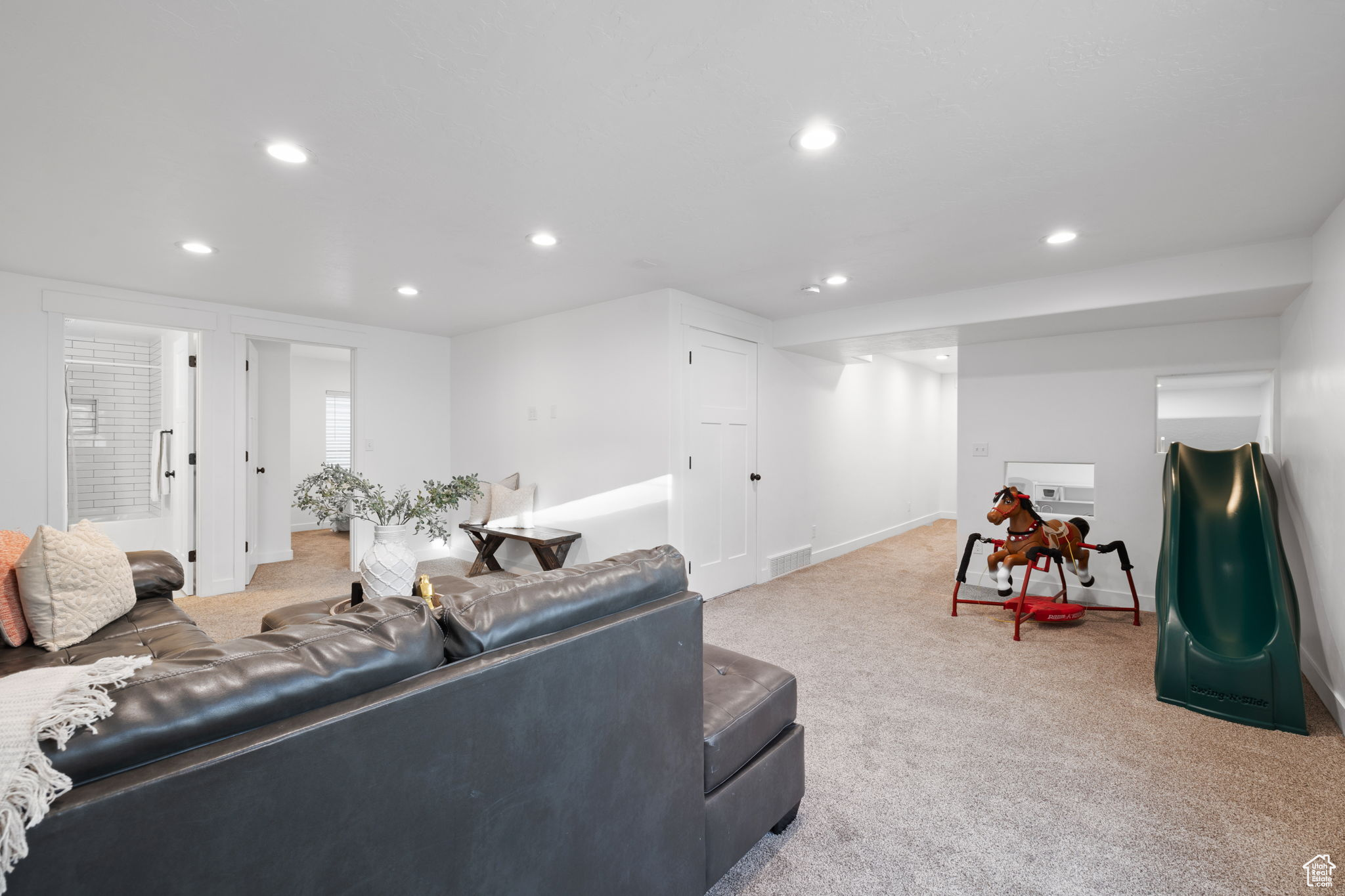 Living room with light carpet