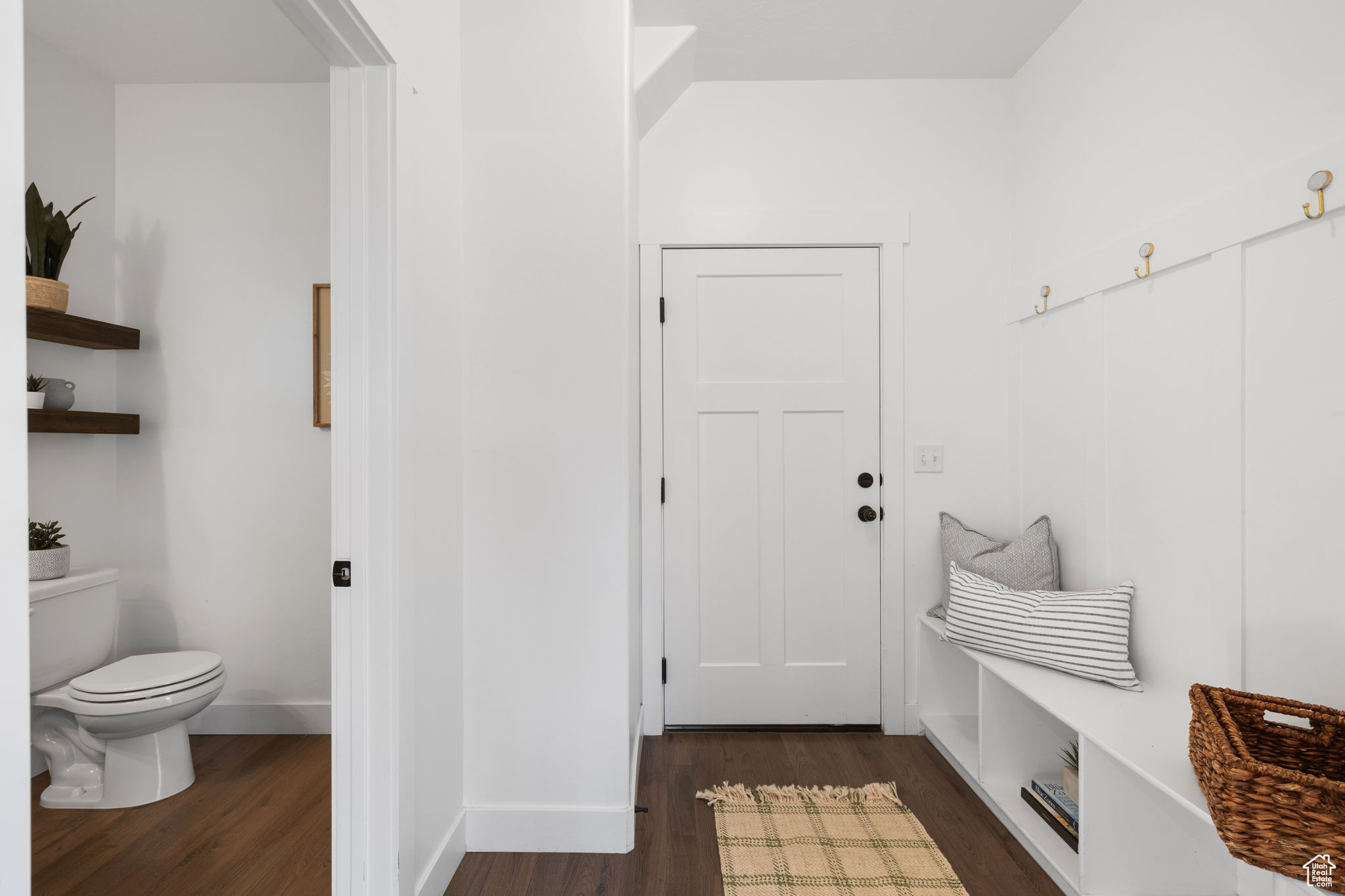 Mudroom with dark wood-type flooring