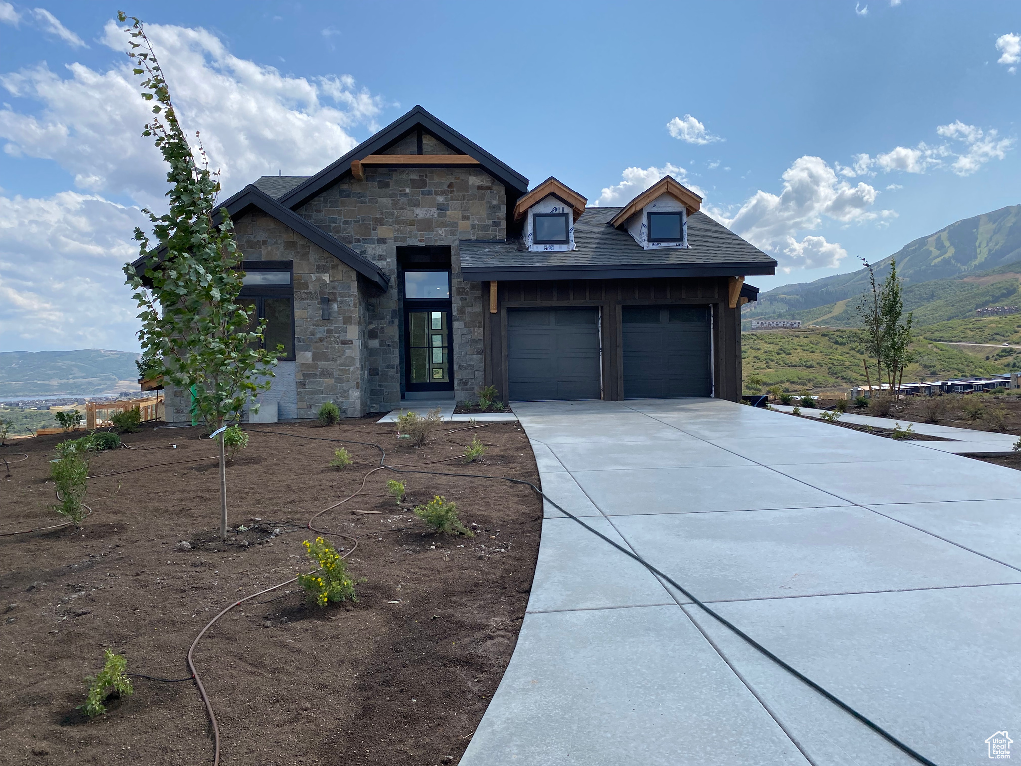 View of front of property with a mountain view