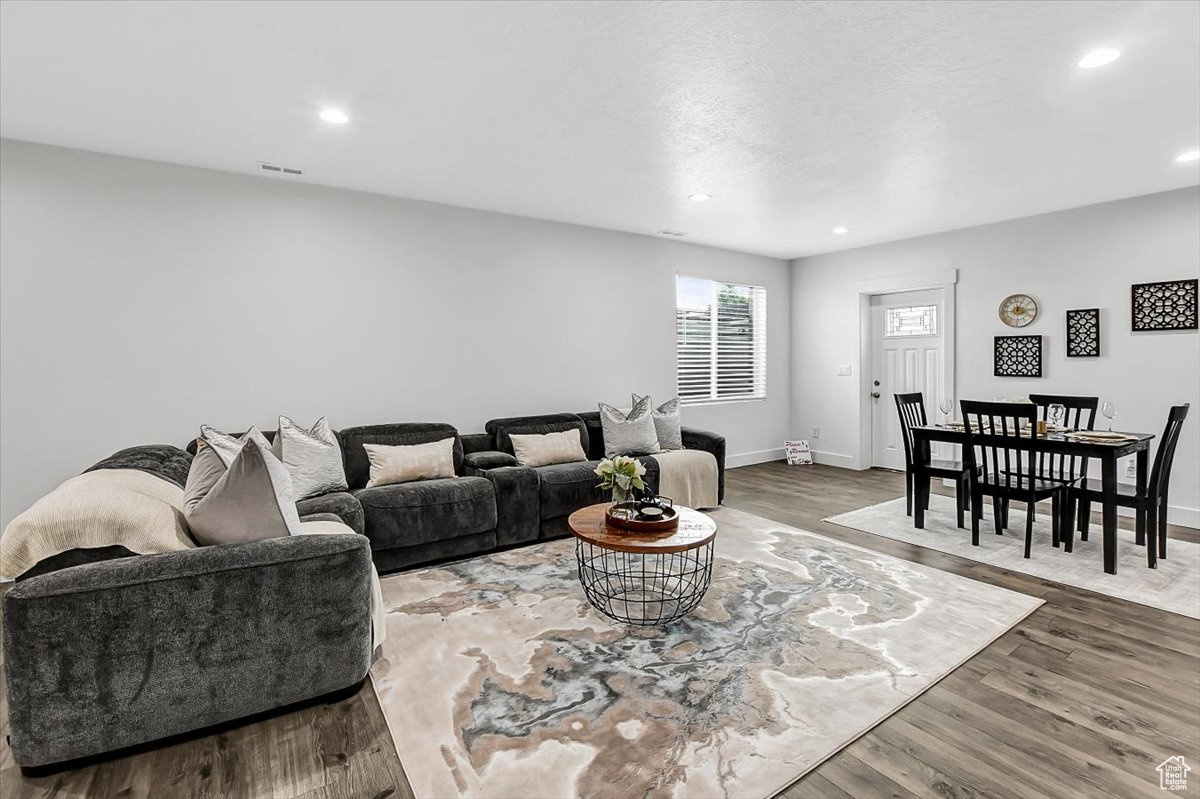 Living room featuring hardwood / wood-style flooring