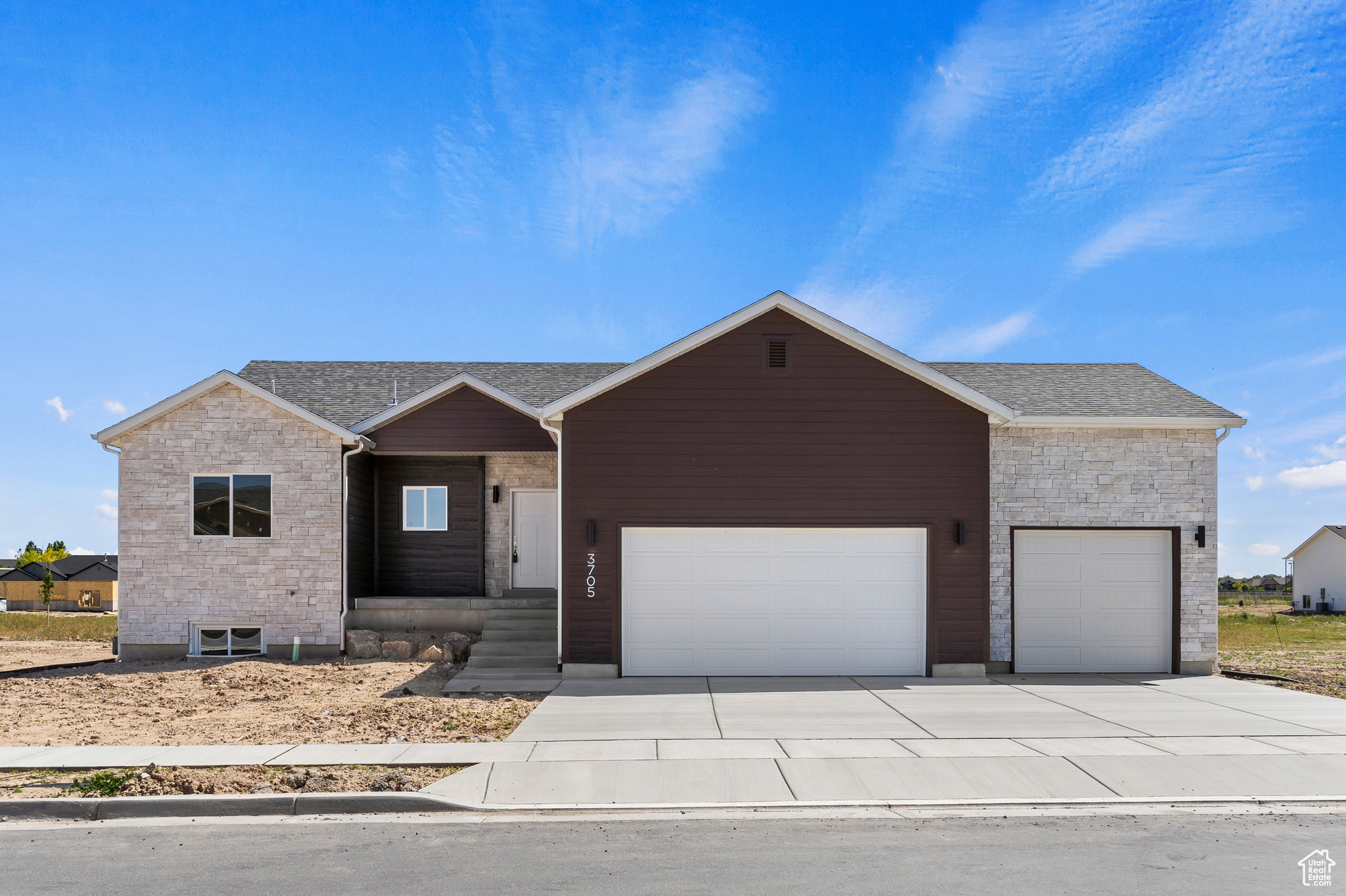 View of front of home with a garage