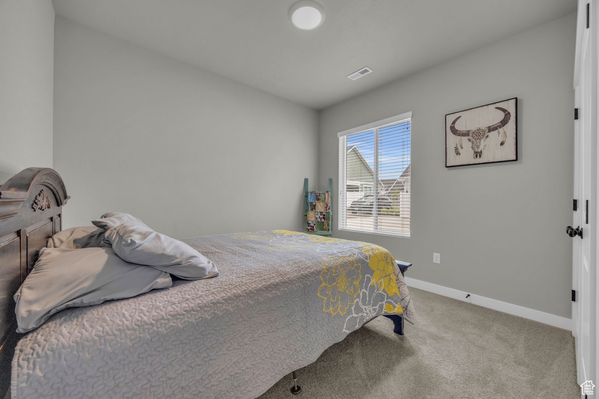 Bedroom with carpet flooring