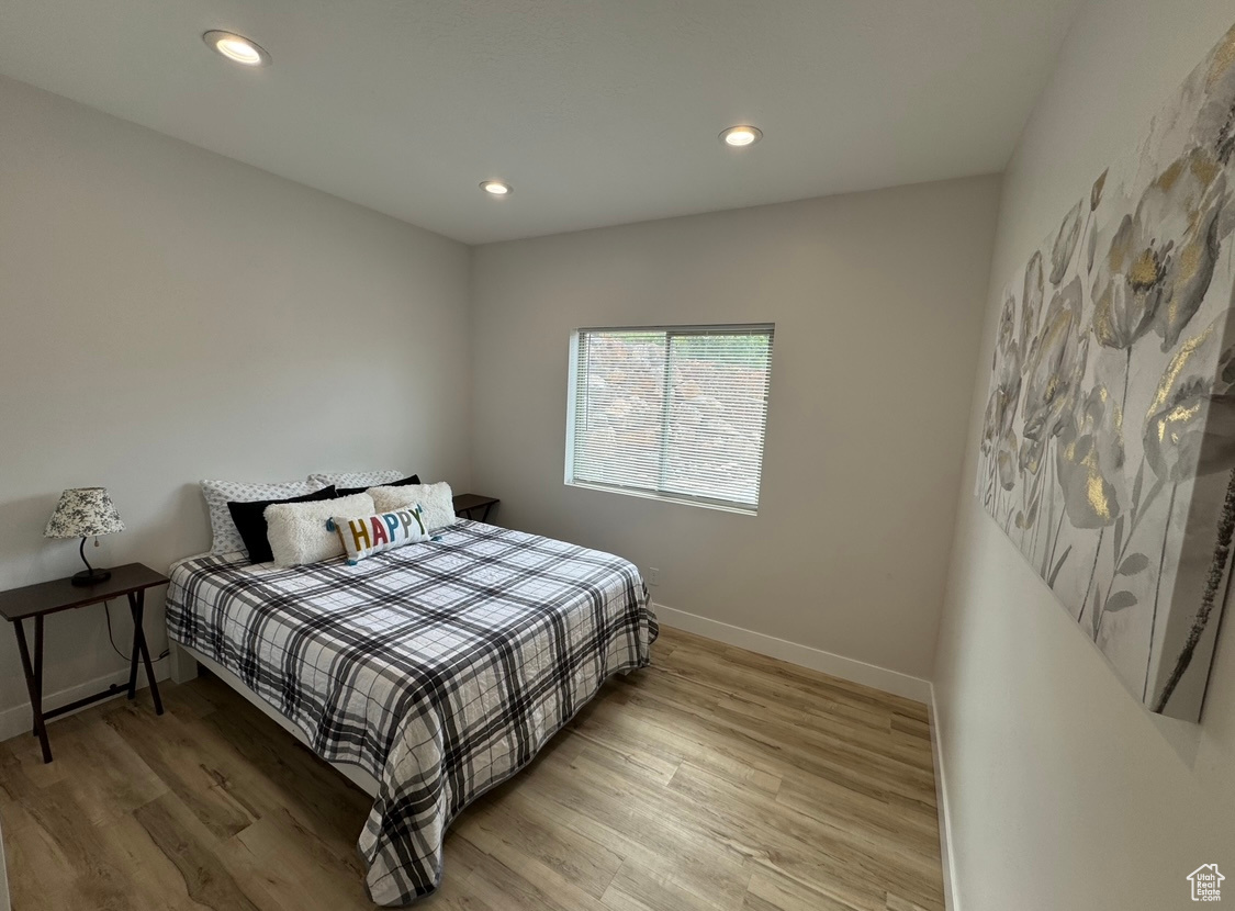 Bedroom featuring hardwood / wood-style floors