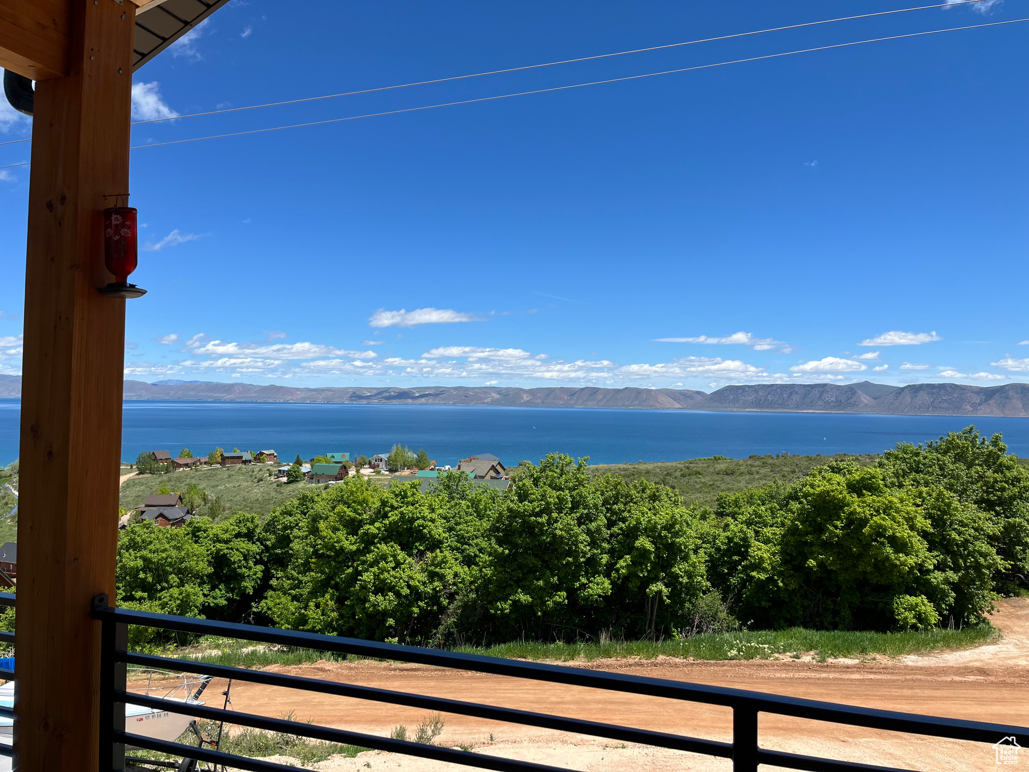 Upper deck View of water feature featuring a mountain view