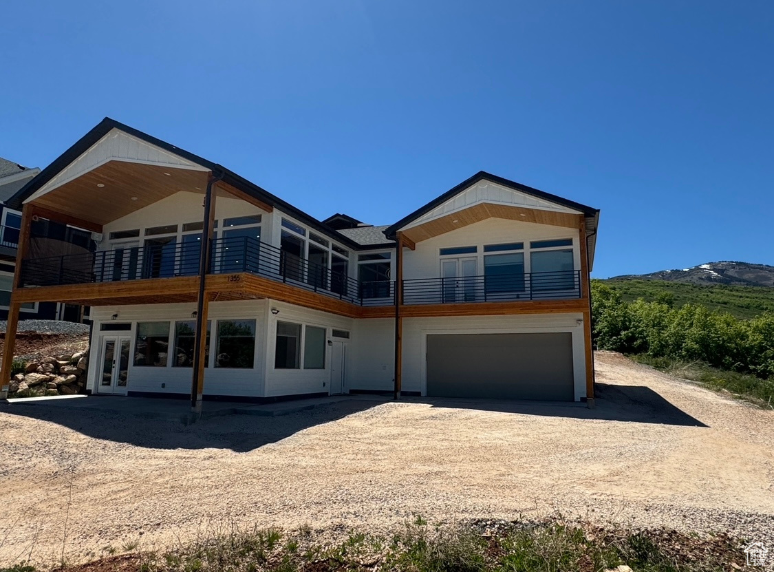 Large windows for a panoramic view of Bear Lake. Lots of covered patio space for outdoor living.