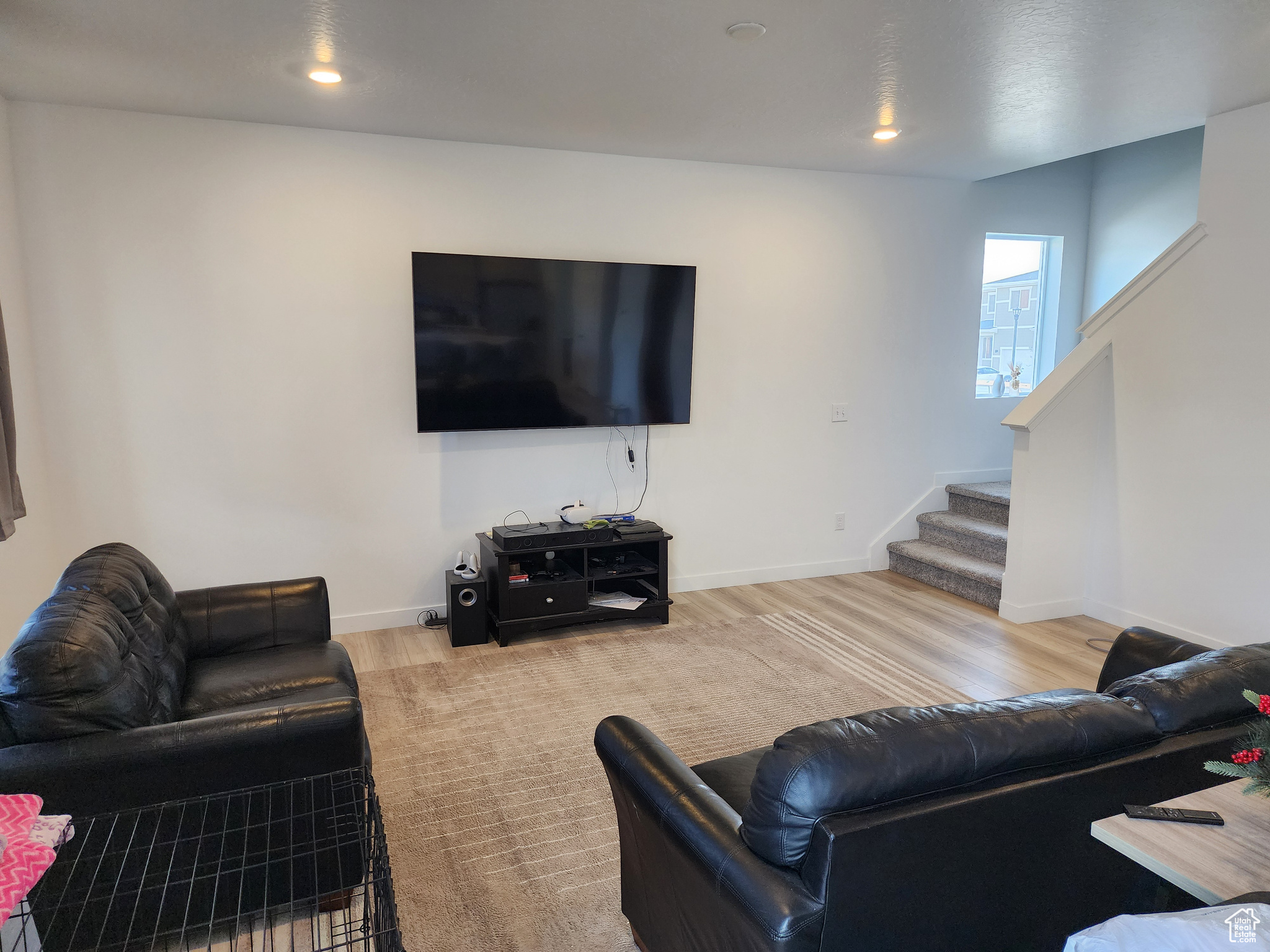 Living room featuring hardwood / wood-style flooring