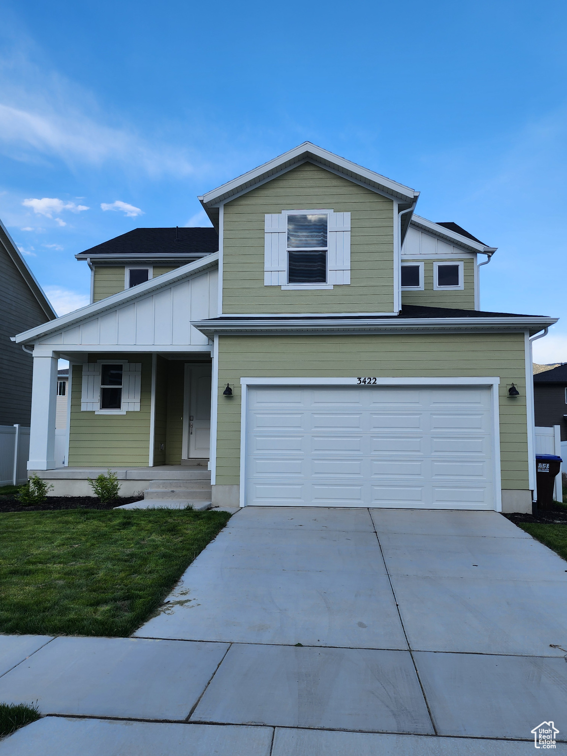 View of property featuring a garage