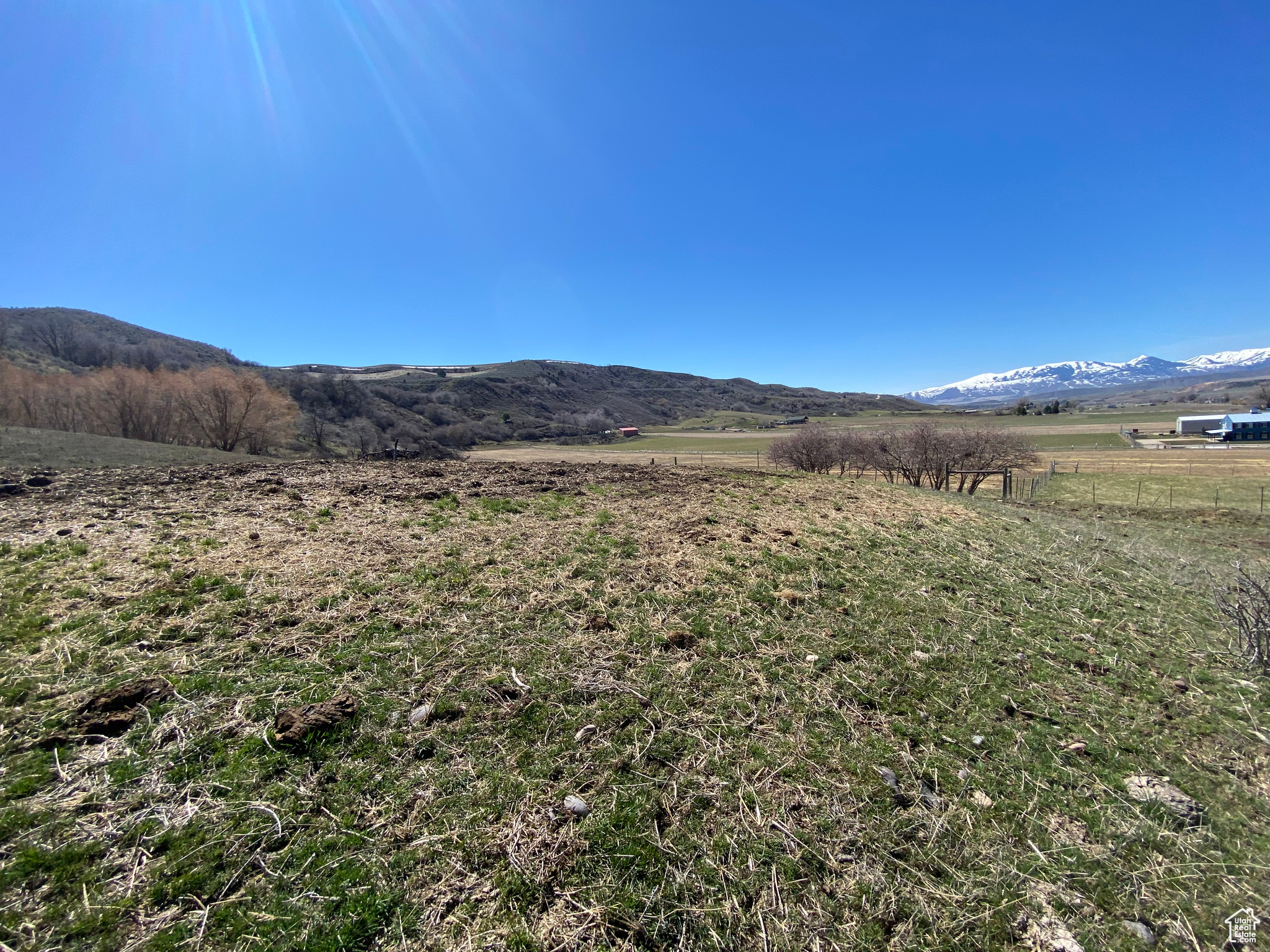 Property view of mountains with a rural view