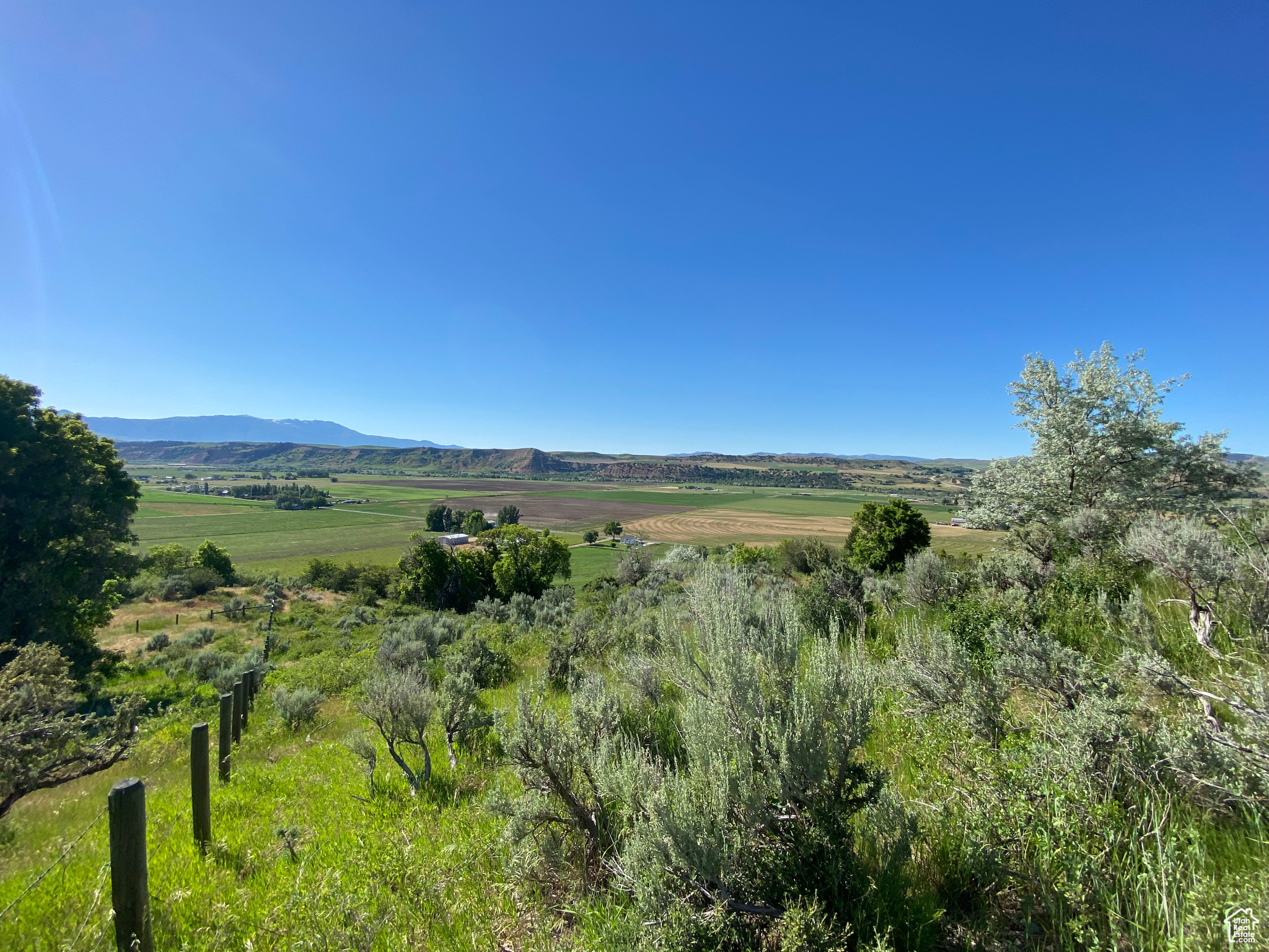 Property view of mountains with a rural view