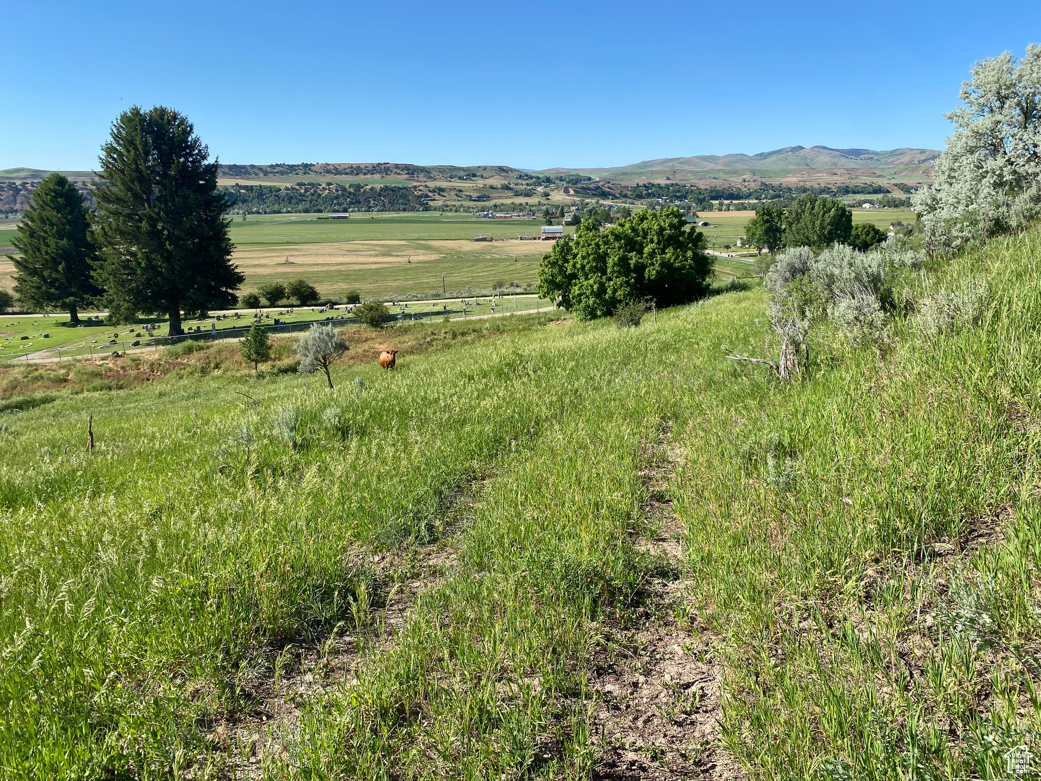 View of mountain feature with a rural view