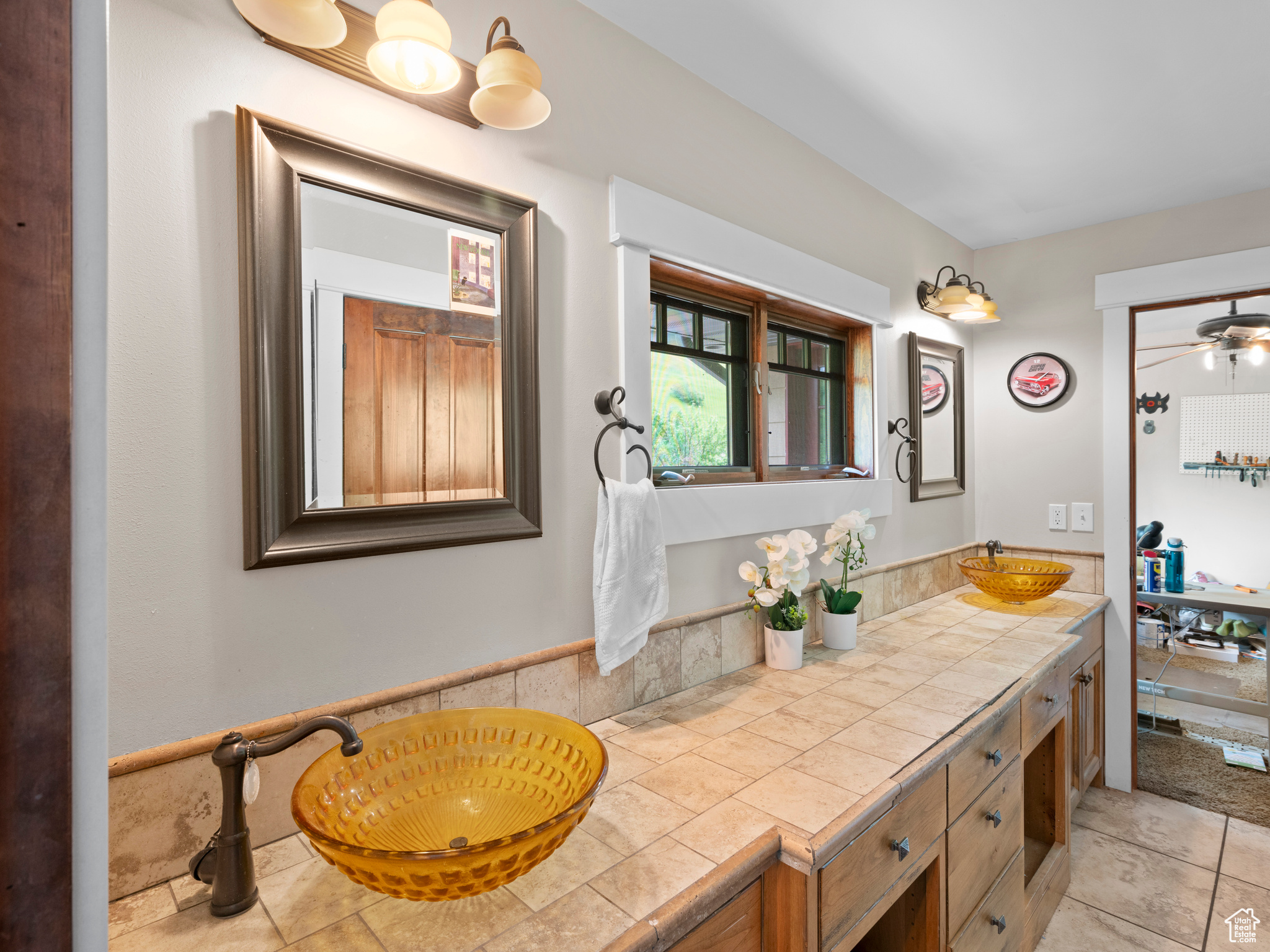 Bathroom with tile flooring and large vanity