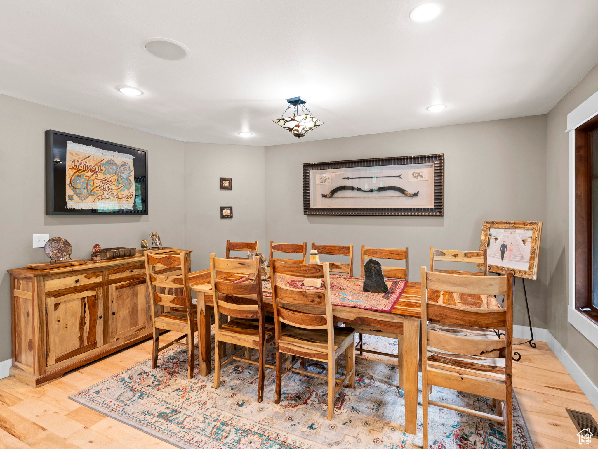 Dining space with light hardwood floors