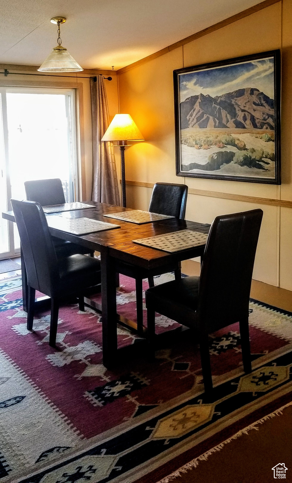 Dining room with vaulted ceiling