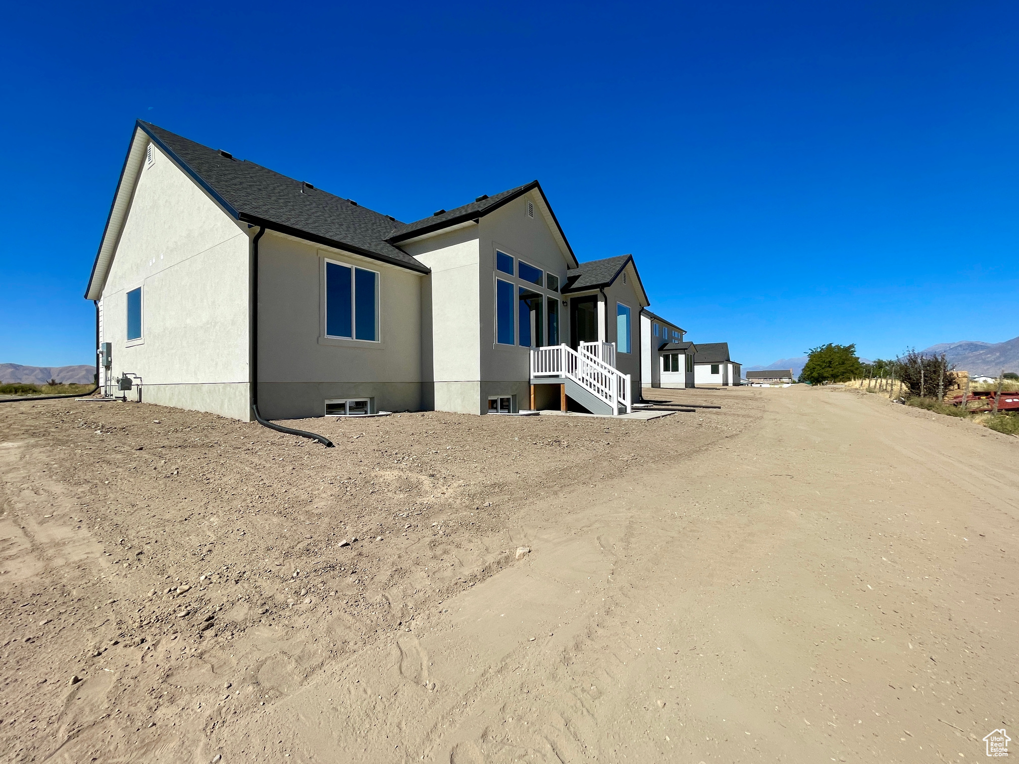 View of property exterior with a mountain view