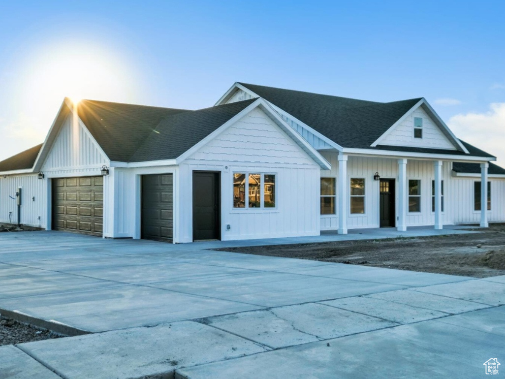 View of front of property featuring a garage