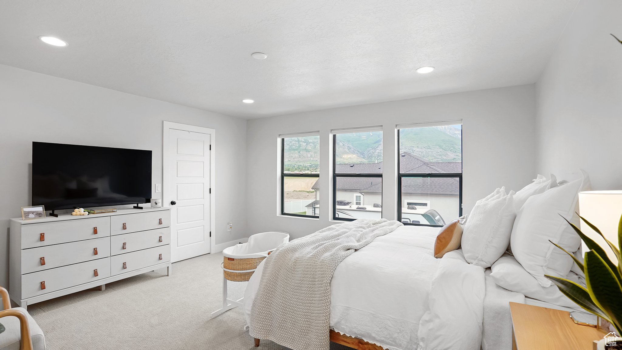 View of carpeted bedroom