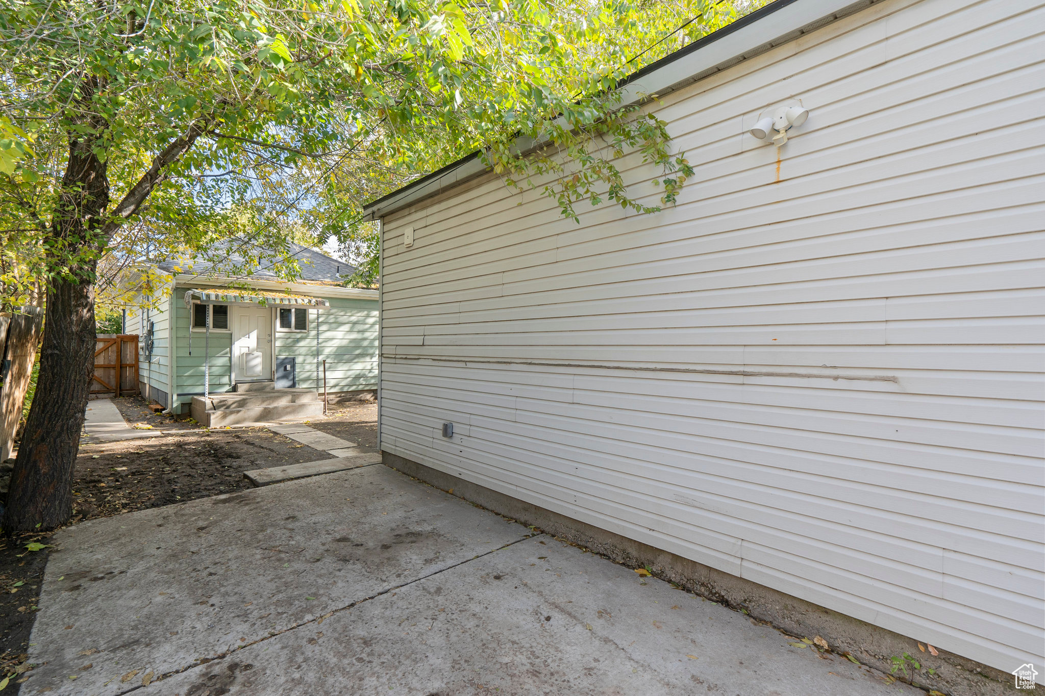 View of property exterior featuring a patio